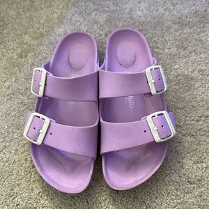 Birkenstocks purple plastic ones
size 37 or women’s 6.5-7